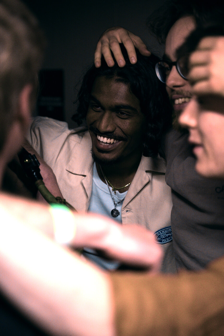 Benji from Happy Garden laughing backstage